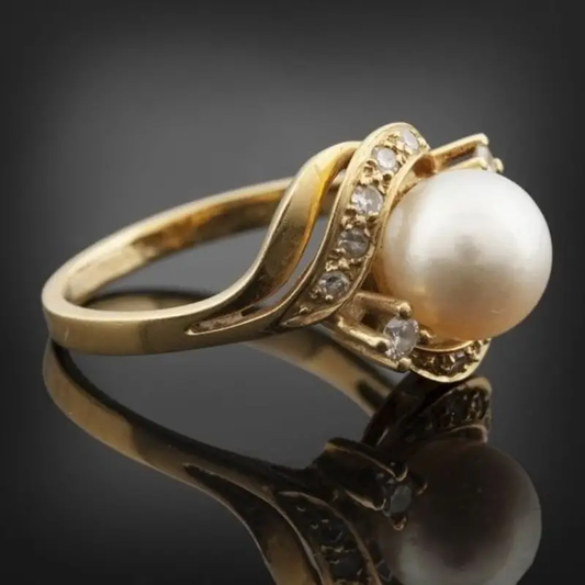 Eleganter Ring mit Perle und Brillantgold 
